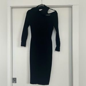 Black fitted high neck dress with neckline peekaboo